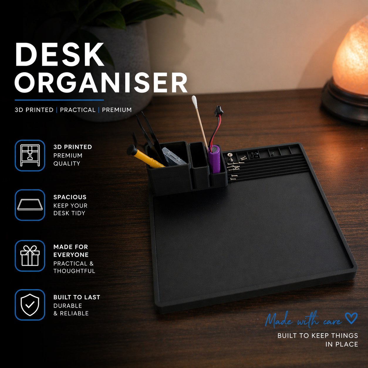 Black 3D-printed desk organiser holding pens and tools